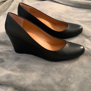 Nine West black leather wedge 3” heel.